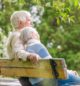 Elderly Couple on a Park Bench Kenneth Perkins Funeral Home